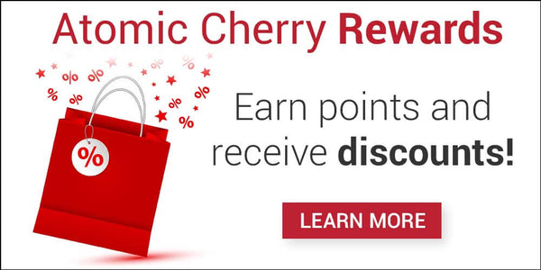 Atomic Cherry rewards earn points and receive discounts- red bag with % in a cirle and stars and % signs flying out