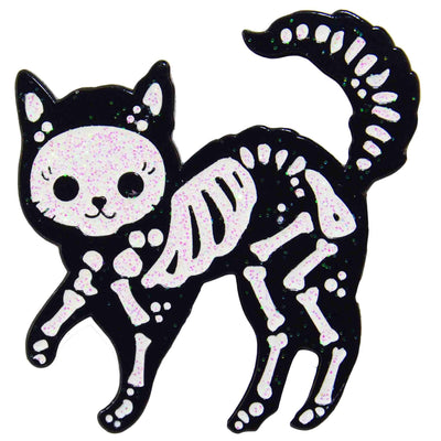 x-ray type image of a cat with the skeleton clearly seen on an enamel pin