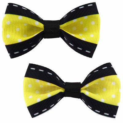 Set of two yellow polka dot hair bows with black trim