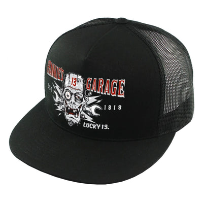 A black trucker style cap with a frankenstein monster and text "Frankies Garage" printed on the front