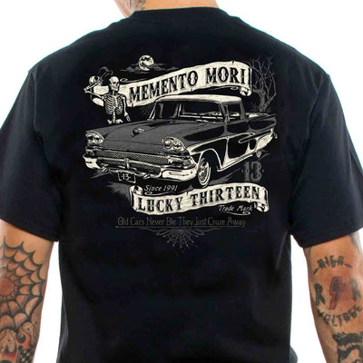 A Black T-shirt with a old car and skeleton motif on the back on tee