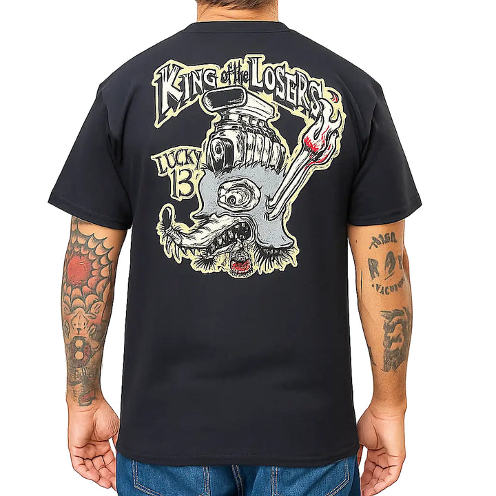 Person wearing a black t-shirt with a graphic design on the back, featuring text and a stylized graphic.