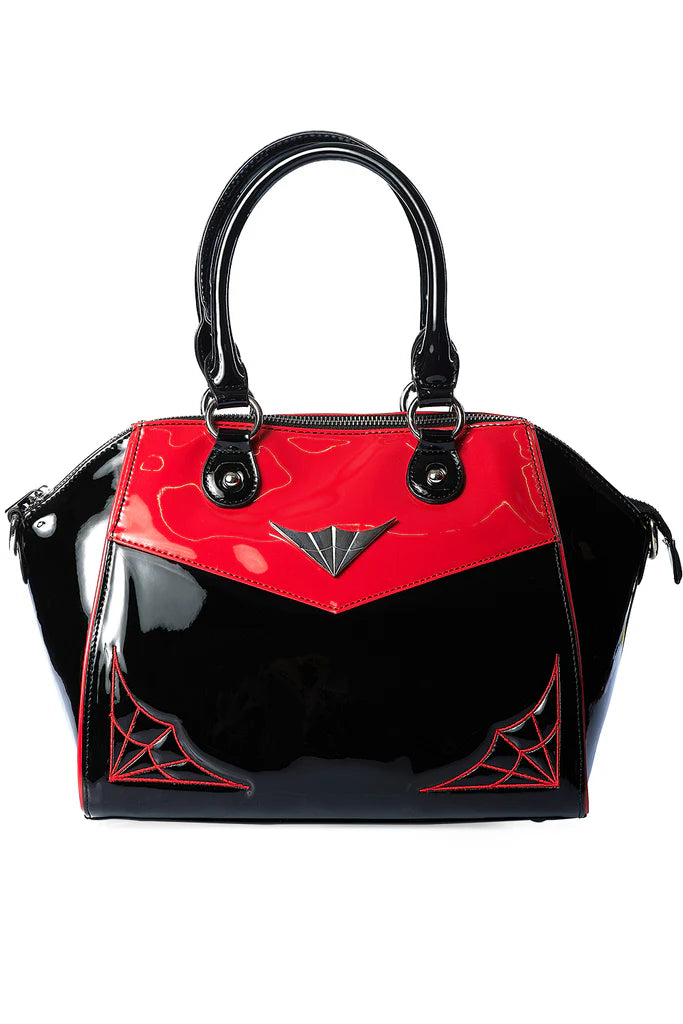 Black and red handbag with spider web design on a white background