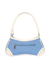 Blue handbag with a white strap on a white background