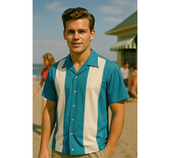 Man wearing a aqua and cream striped shirt on a beach with people in the background
