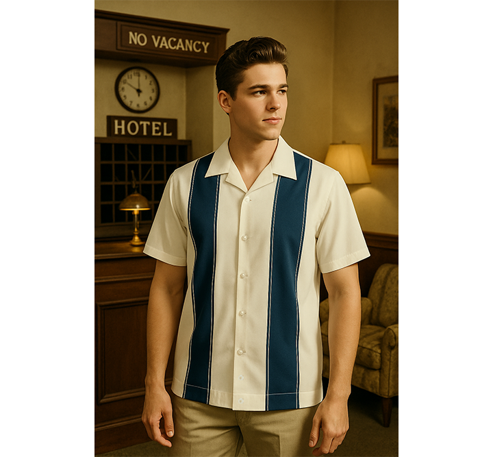 Man wearing a cream shirt with Navy stripes in a hotel lobby setting.