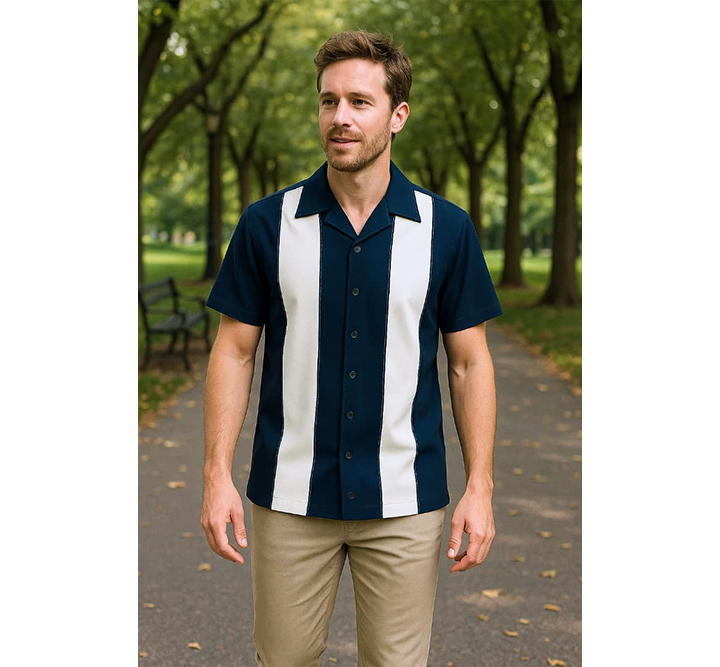Man wearing a navy and white striped shirt in a park setting