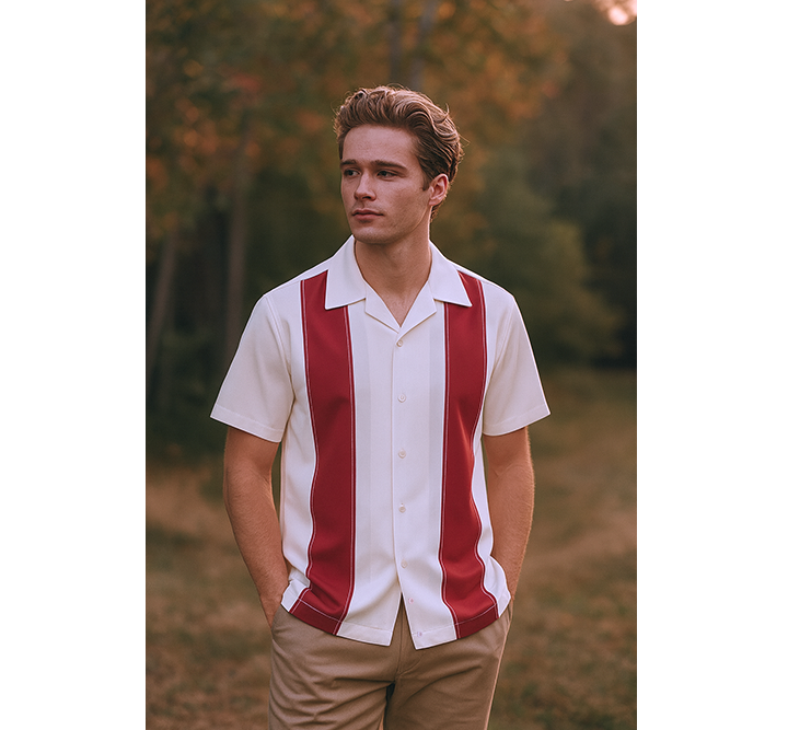 Man wearing a red and white striped shirt outdoors