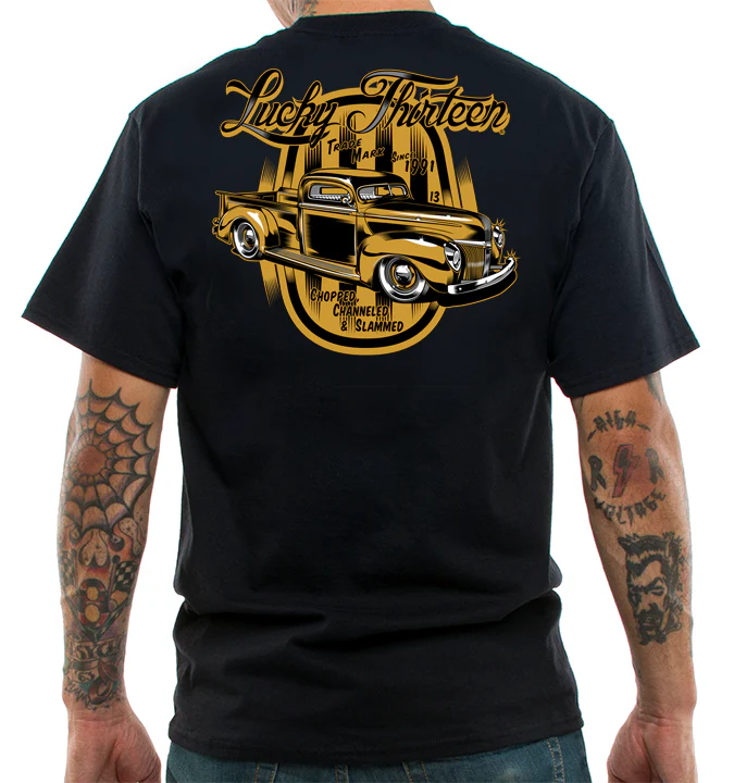Black t-shirt with yellow graphic of a classic car and 'Lucky Thirteen' text on the back.