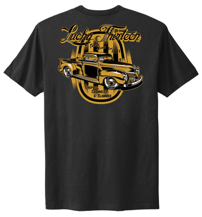 Black t-shirt with yellow graphic of a classic car and text on a white background