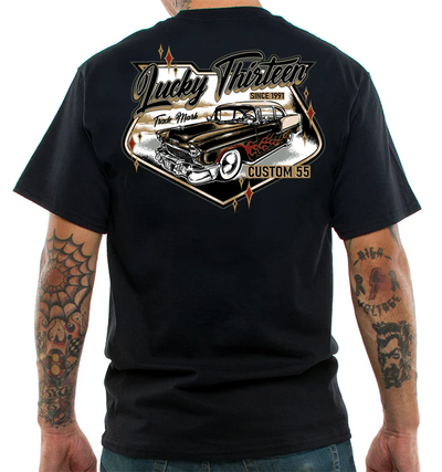 Black t-shirt with a graphic design on the back featuring a classic car and text.