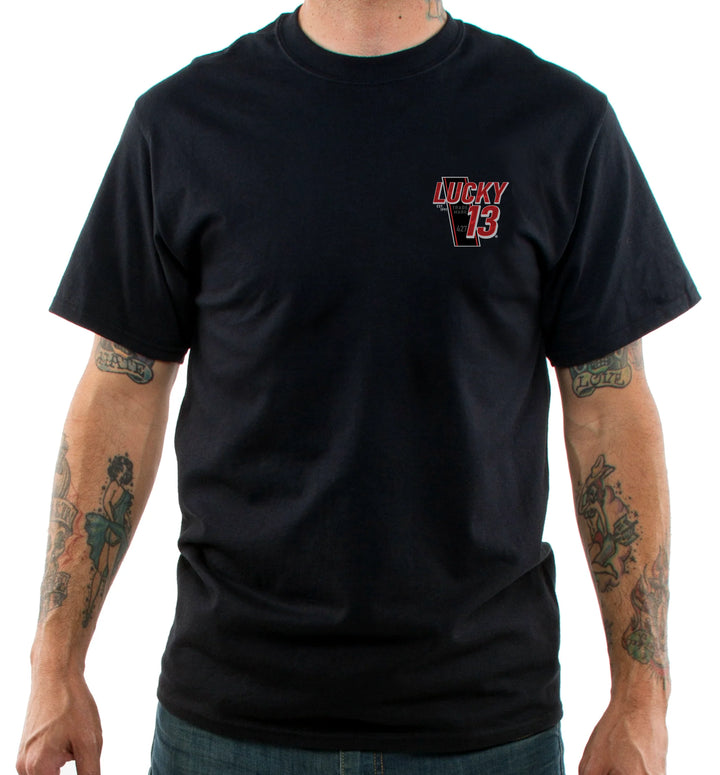 Person wearing a black t-shirt with a Red 'Lucky 13' logo on a white background