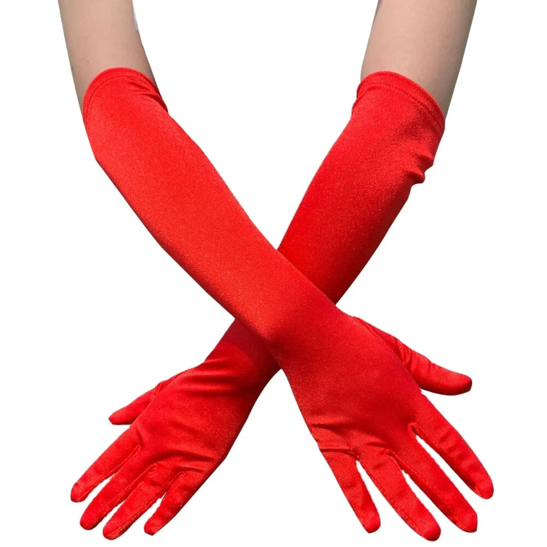 Image of above the elbow red satin gloves on hands that are crossed