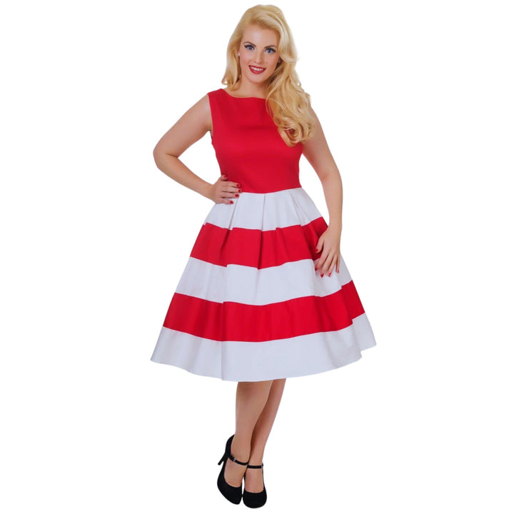 Front view of blonde lady wearing a red and white dress and heels