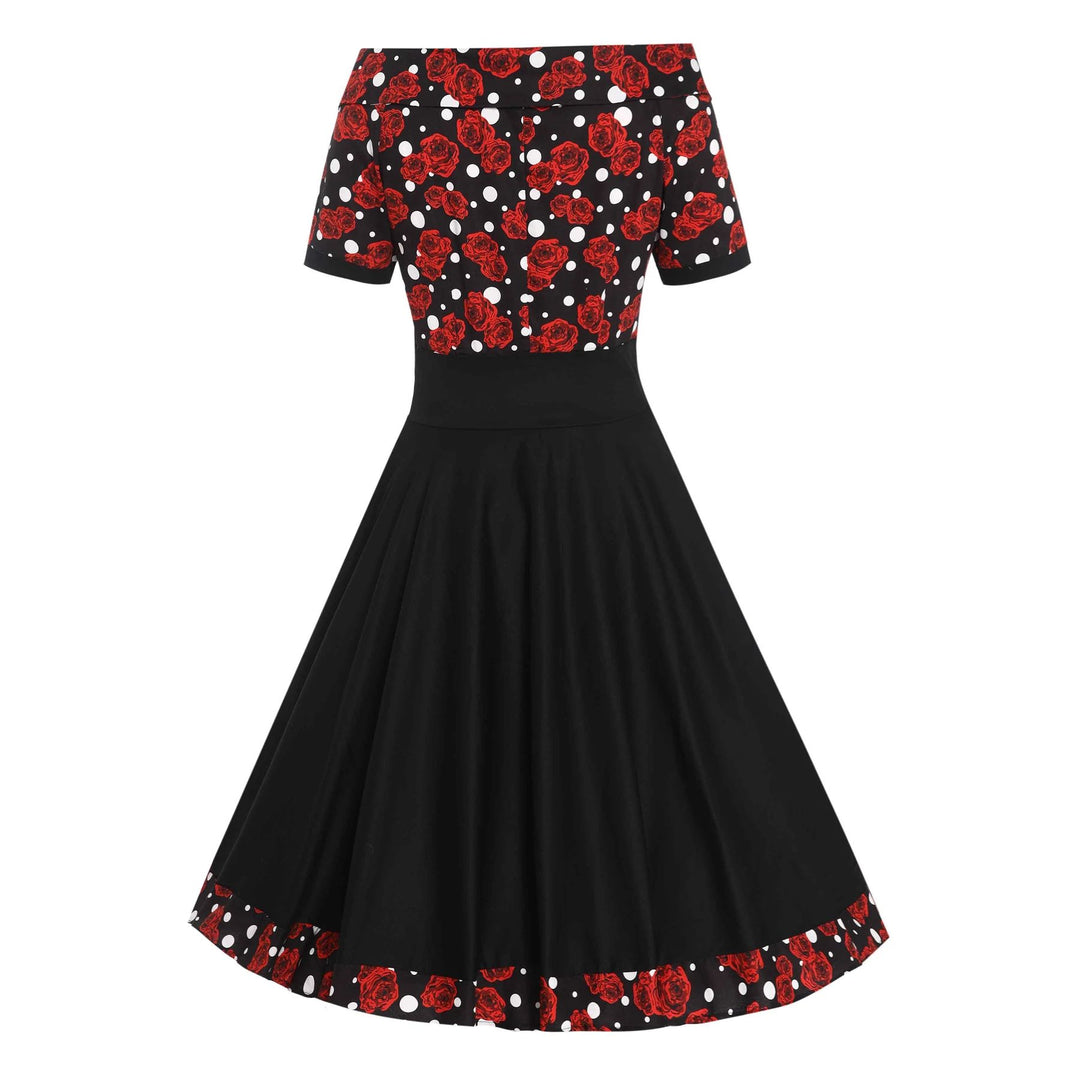 Back image of a black dress with rose and white polka dot pattern 