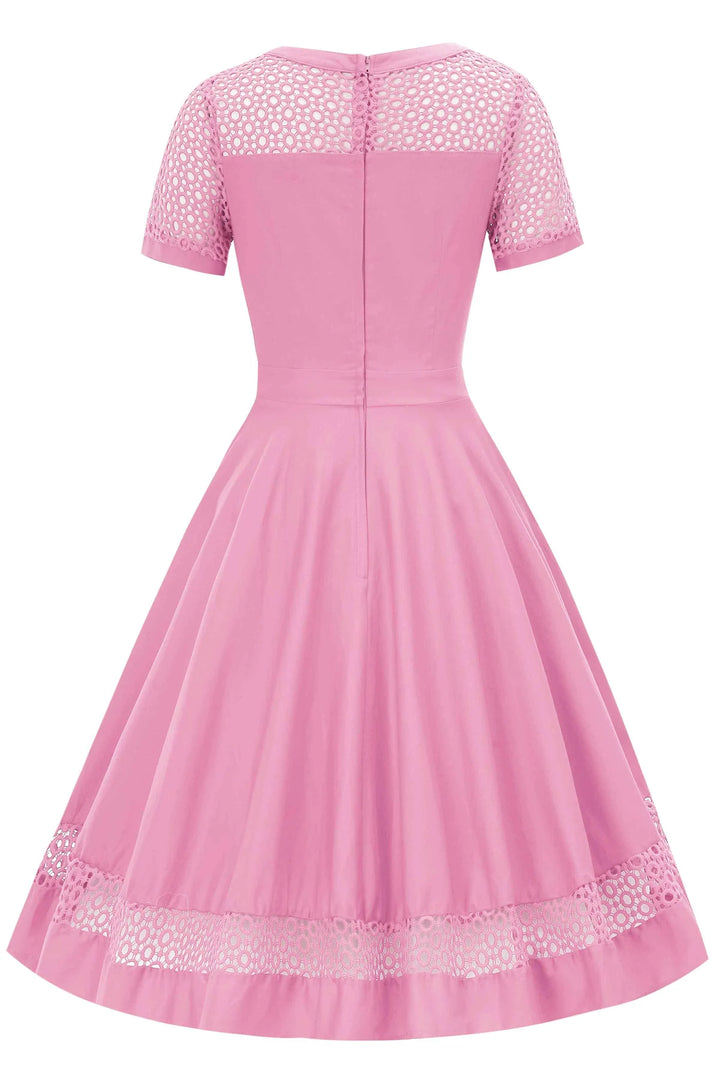 Back view of Pink dress with lace details on a white background