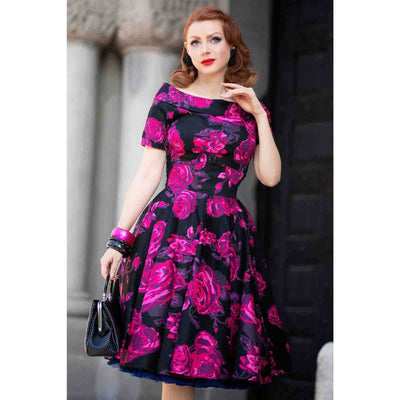 Red haired model wearing the darlene pink and violet floral print