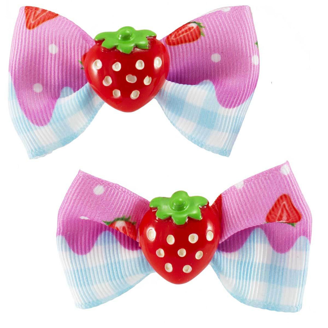 Pink icecream and blue and white gingham hair clips with resin strawberries in the middle of the bows