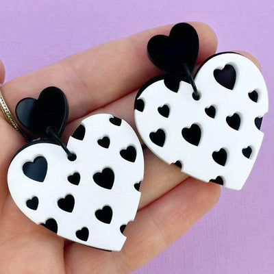 Lost Minds Earrings - Layered Hearts - Black/White Studs held in hand