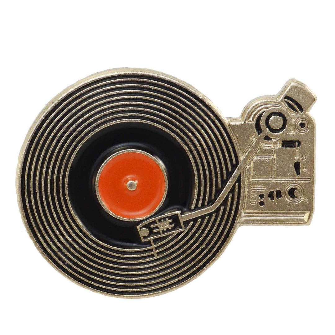 an emamel pin of a old school vinyl record player