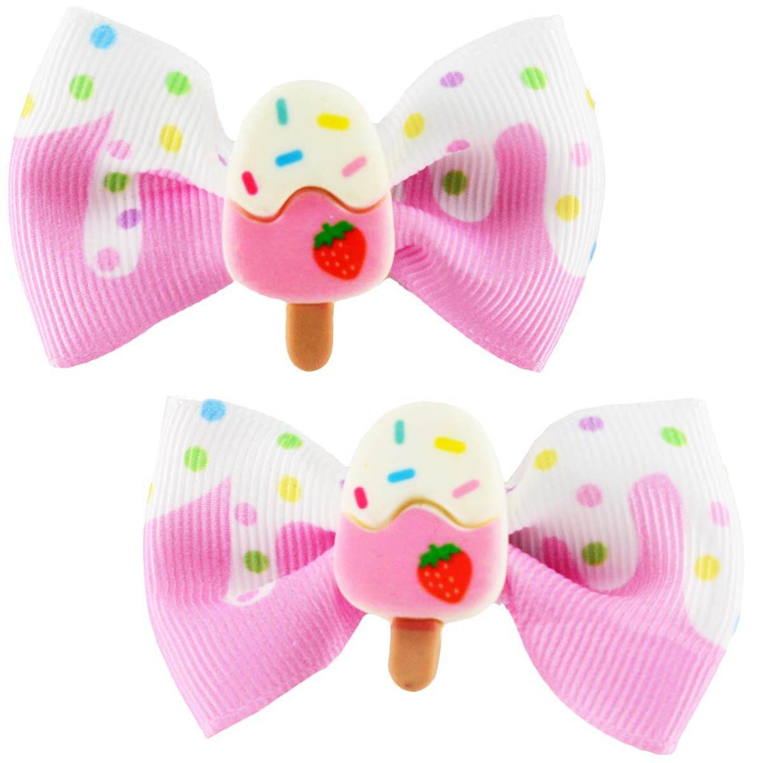 Set of two ice cream hair bows with white at the top and pink at the bottom. There is an ice cream with white sprinkles and pink at the bottom on a stick