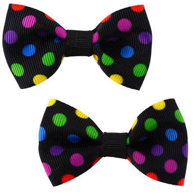 set of 2two retro hair bows with multicoloured polka dots on a black background