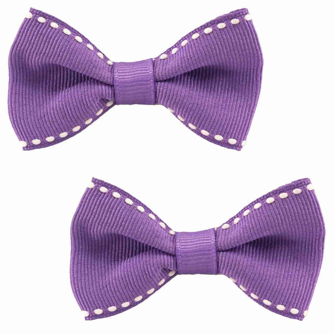 Purple Bow hair clips with White sticking a set of 2