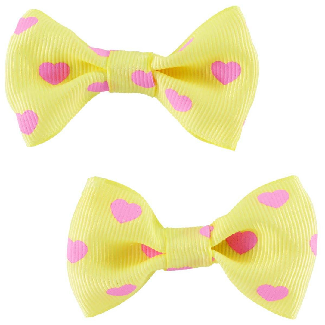 Cute yellow bows with pink Hearts 