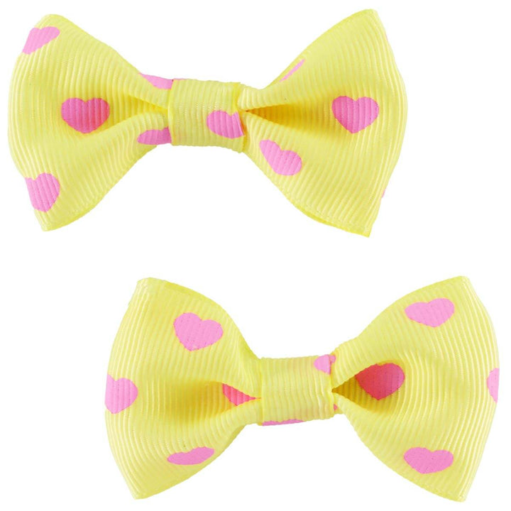 Cute yellow bows with pink Hearts 