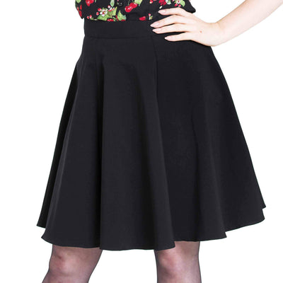 Hell Bunny Greta Skirt in black on model with her hand on her hip