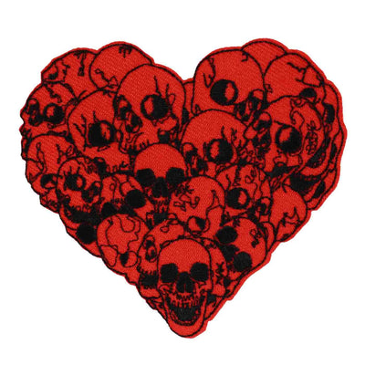 Embroidered red heart shaped patch with skulls all over it 