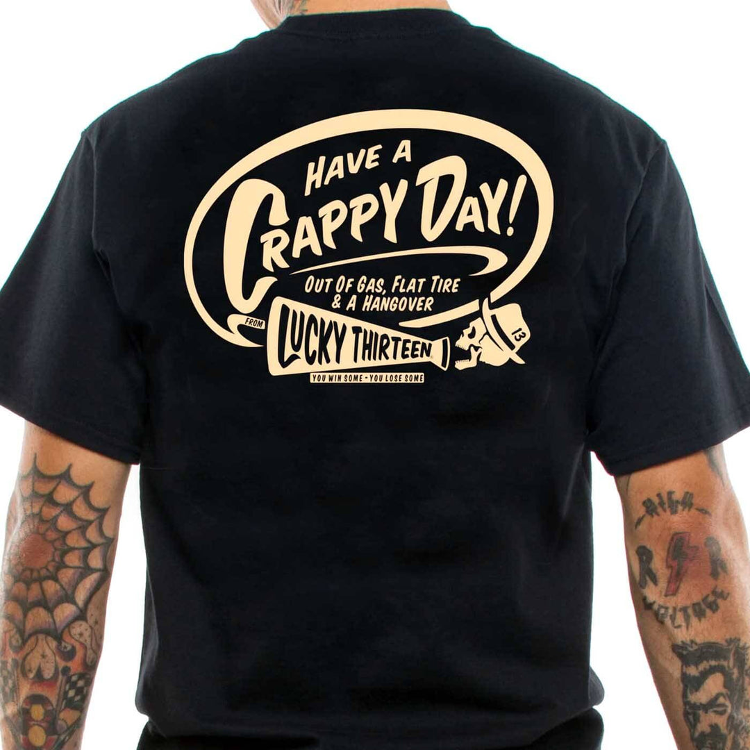 A black t-shirt with a back print of "Crappy Day" Motif