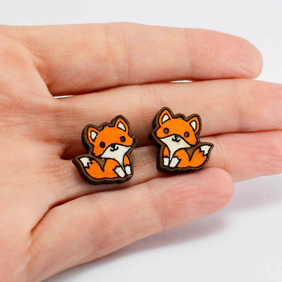 Marshmallow Moon Earrings - Wooden Fox Studs held in hand so show size