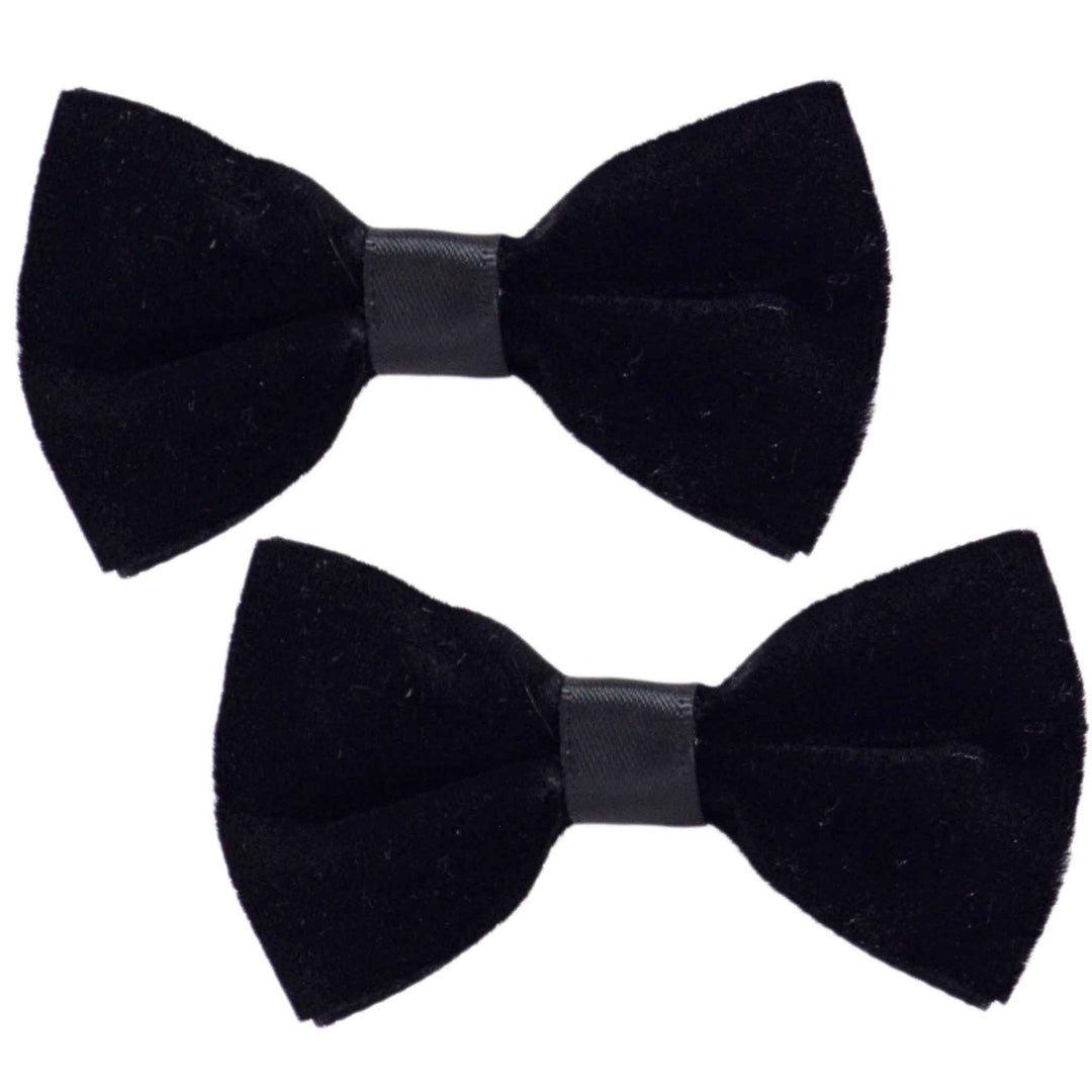 a pair of black velvet hair clips