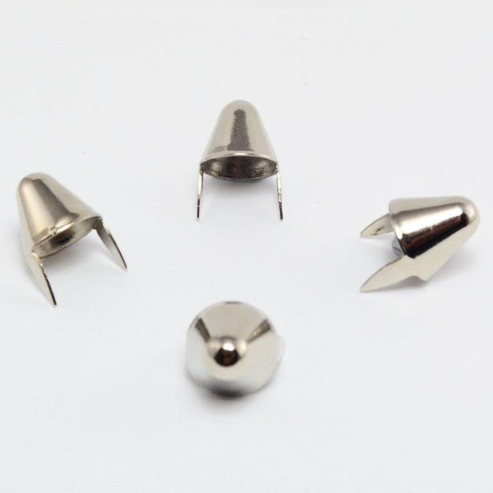 4 individual studes showing the detail of  UK77 Cone Studs 